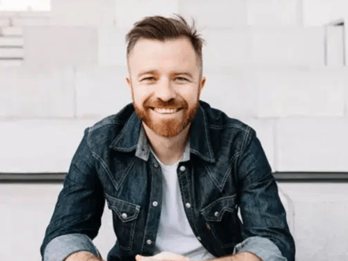 Jason Bagley portrait smiling in casual setting discussing email marketing strategy and newsletter growth