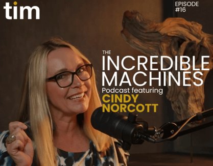 Cindy Norcott in The Incredible Machines Podcast studio during Episode 16, offering empowering insights on intentional leadership and purpose-driven entrepreneurship. Her vibrant energy, glasses, and patterned top reflect her message of ethical growth and clarity in business.