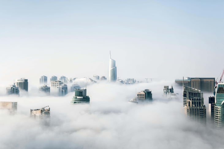 cityscape-rising-through-cloud-economy