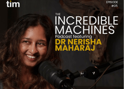 Dr Nerisha Maharaj shares insights on spiritual intelligence and self-love in leadership on Episode 5 of The Incredible Machines Podcast. Her warm smile and relaxed posture reflect the inner calm she advocates, seated before the mic with the wooden wall sculpture in the Tim Africa studio.