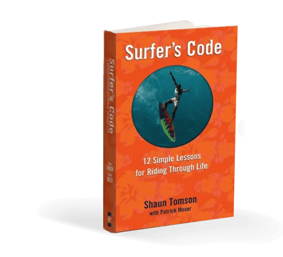Original Surfer's Code book by Shaun Tomson, outlining 12 simple lessons for riding through life inspired by surfing and personal growth.