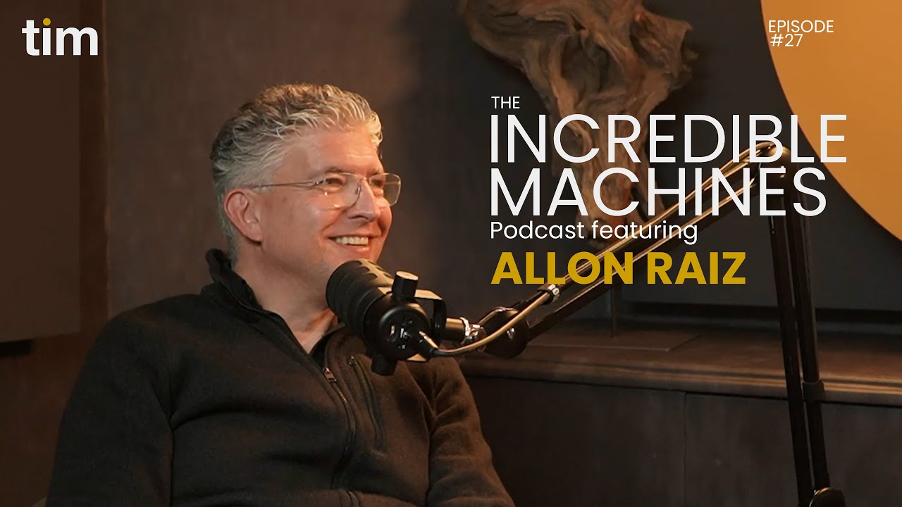 Entrepreneur and mentor Allon Raiz speaking into a microphone on The Incredible Machines Podcast Episode 27, filmed in Tim Africa's signature podcast studio setup.