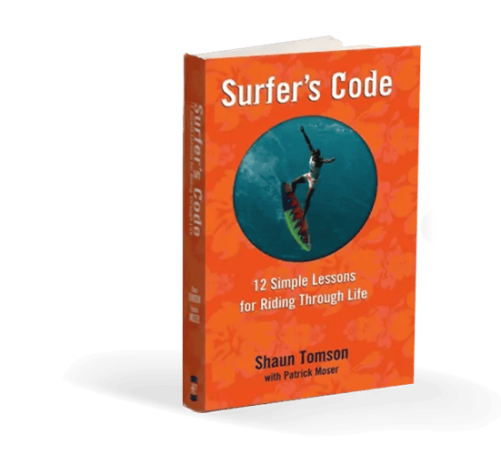 Original Surfer's Code book by Shaun Tomson, outlining 12 simple lessons for riding through life inspired by surfing and personal growth.