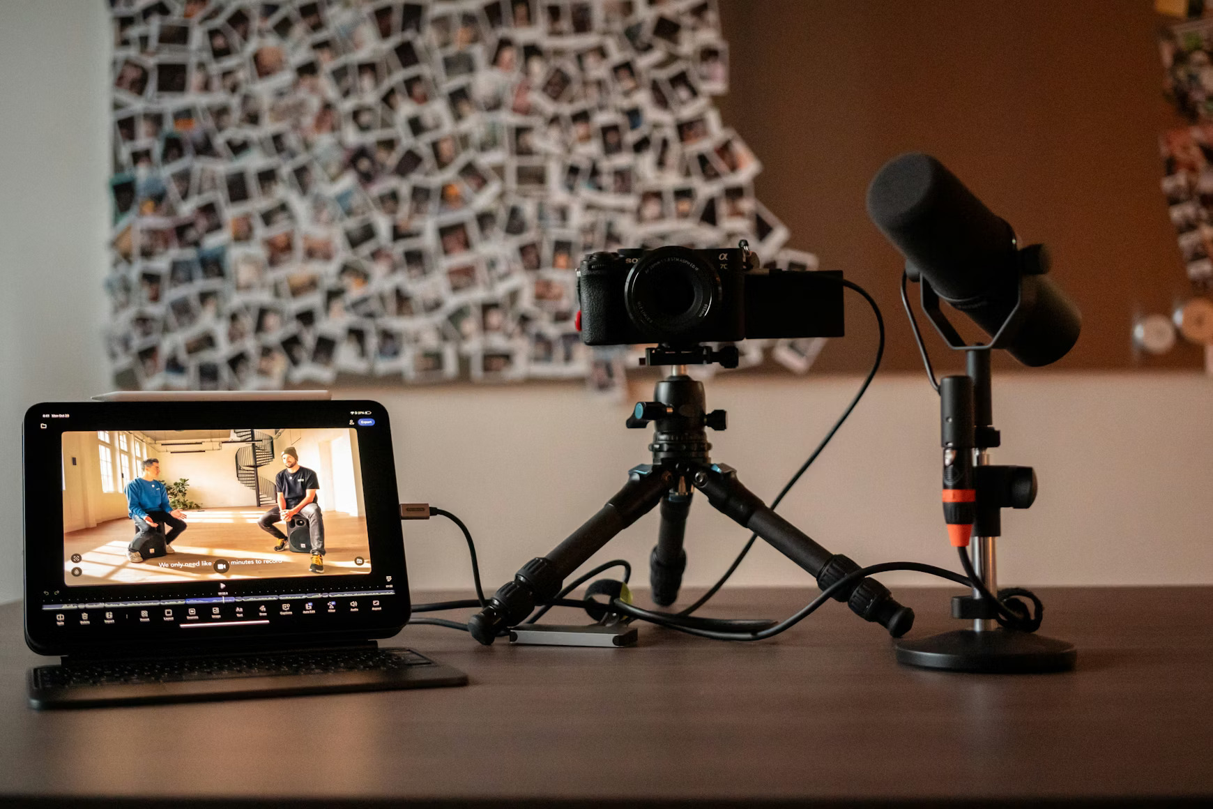 Video podcast studio setup with camera and microphone showing how video podcasts drive audio podcast discovery and social media growth.